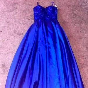 size 1/2 blue ball gown, strapless, has pockets, never worn